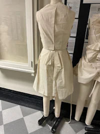 two mannequins on display in a room