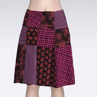 a mannequin mannequin wearing a patchwork skirt