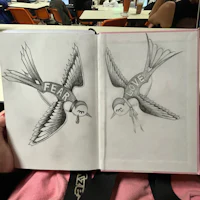 a book with a drawing of a bird on it