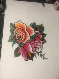 a tattoo of two roses on a piece of paper
